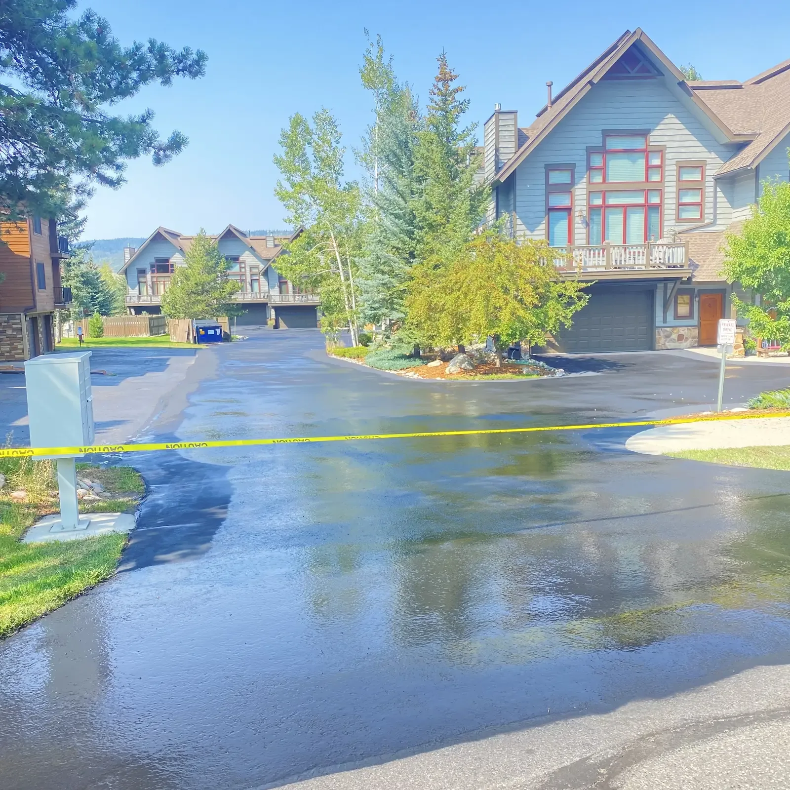Seal coated community drive with fresh striping at a lodge — near Calhan, CO