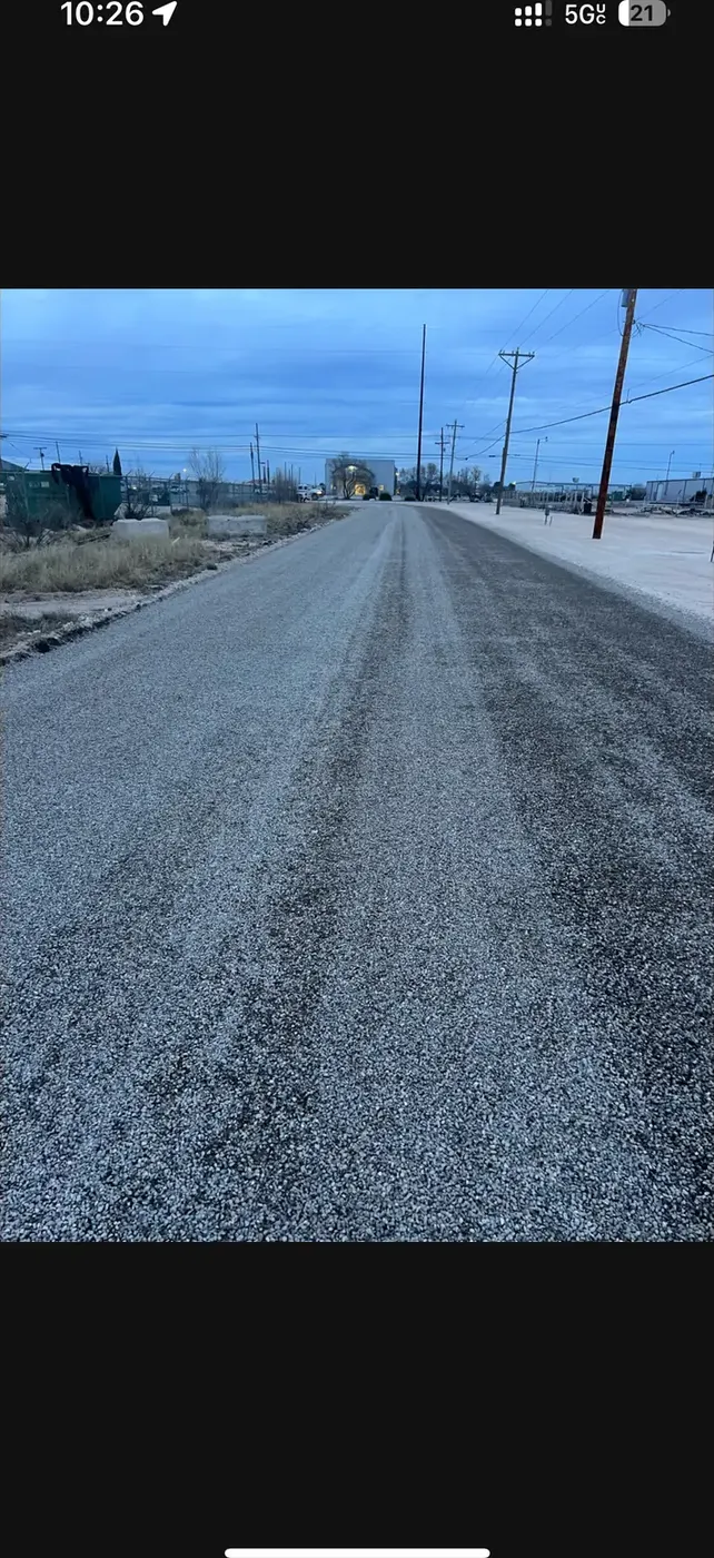Finished chip seal lane showing tight rock chip texture