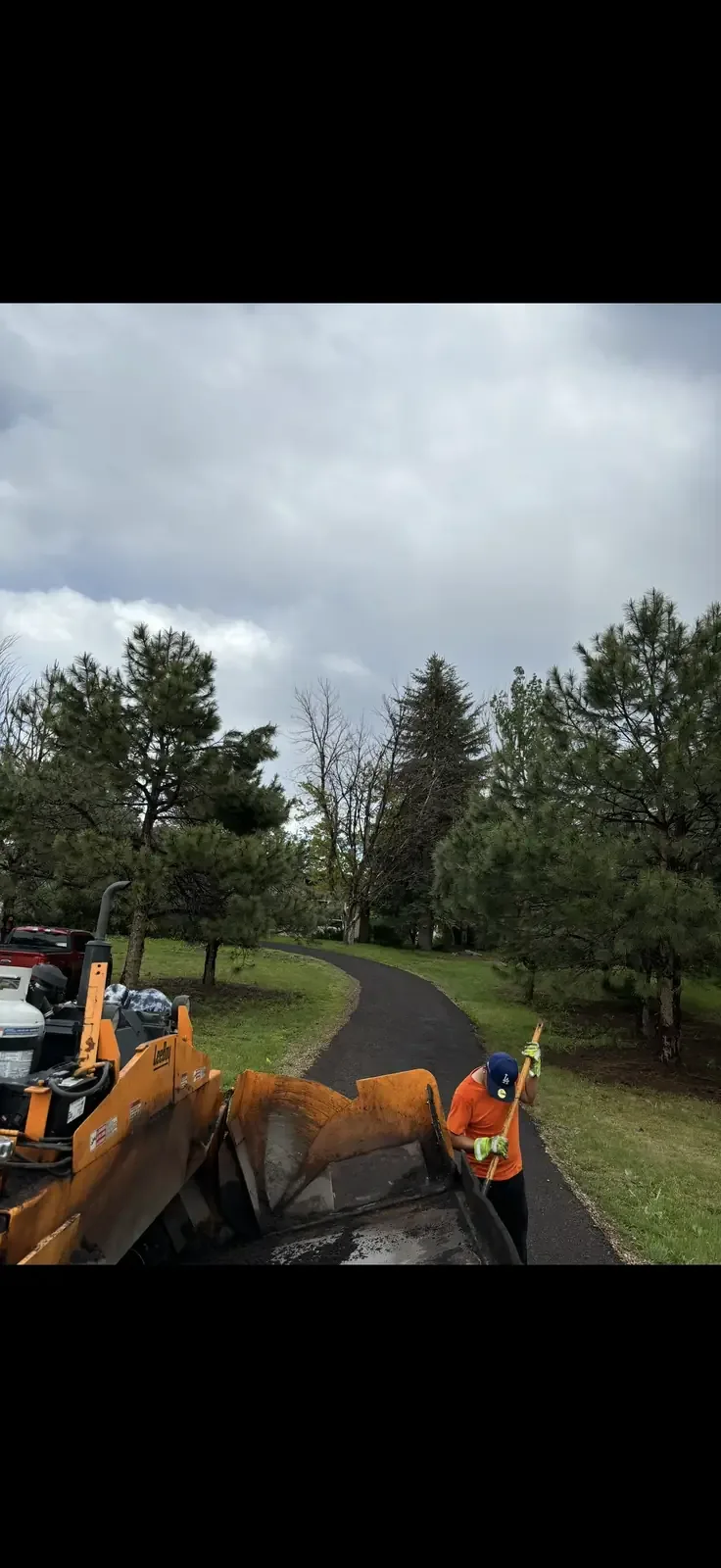 Crew grading and compacting driveway base material — near Fountain, CO