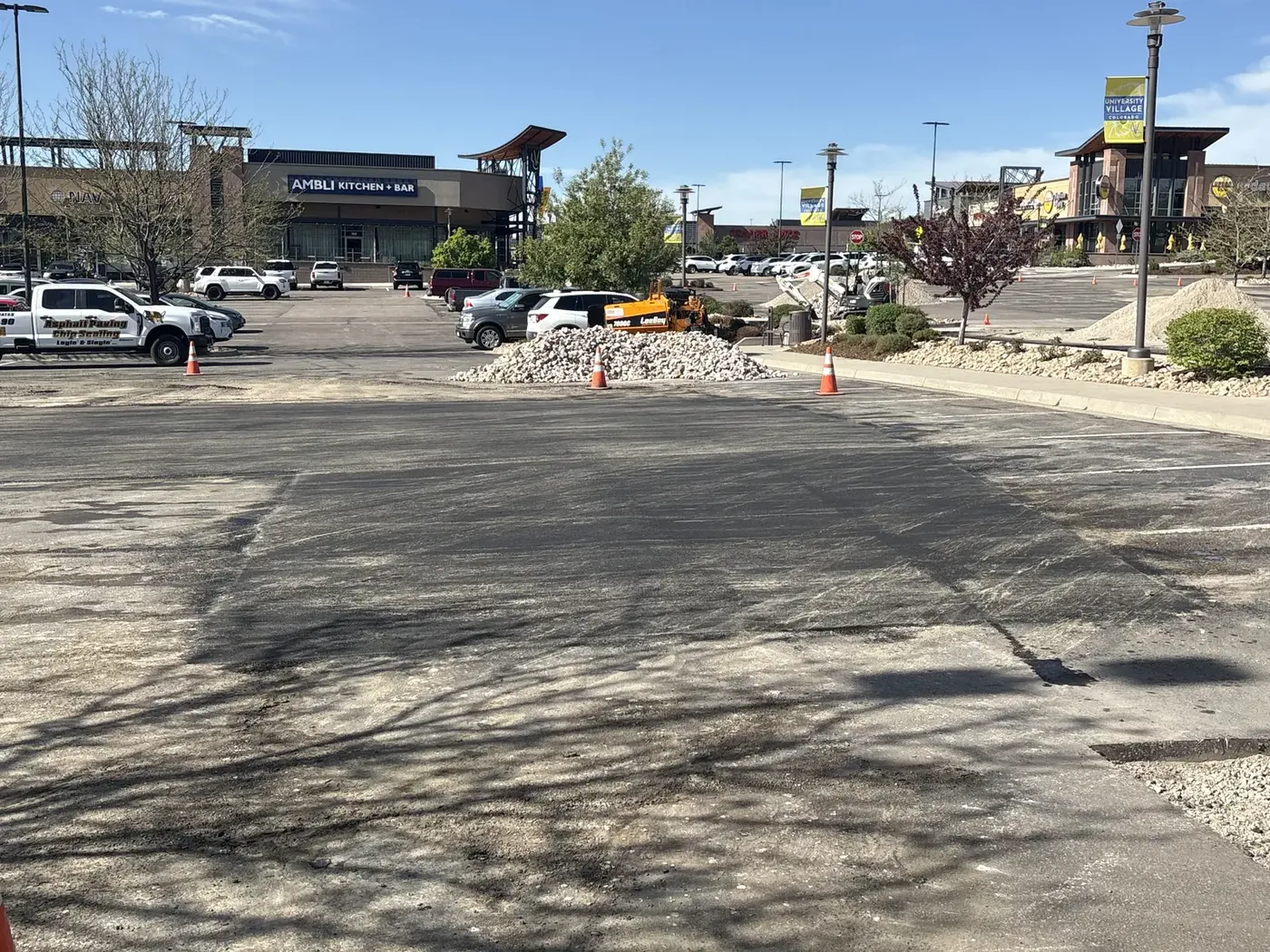 Repair and removal work staged in a shopping center lot